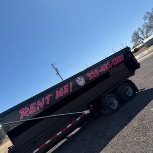Black Rapid Rolloff dumpster with pink Rent Me lettering