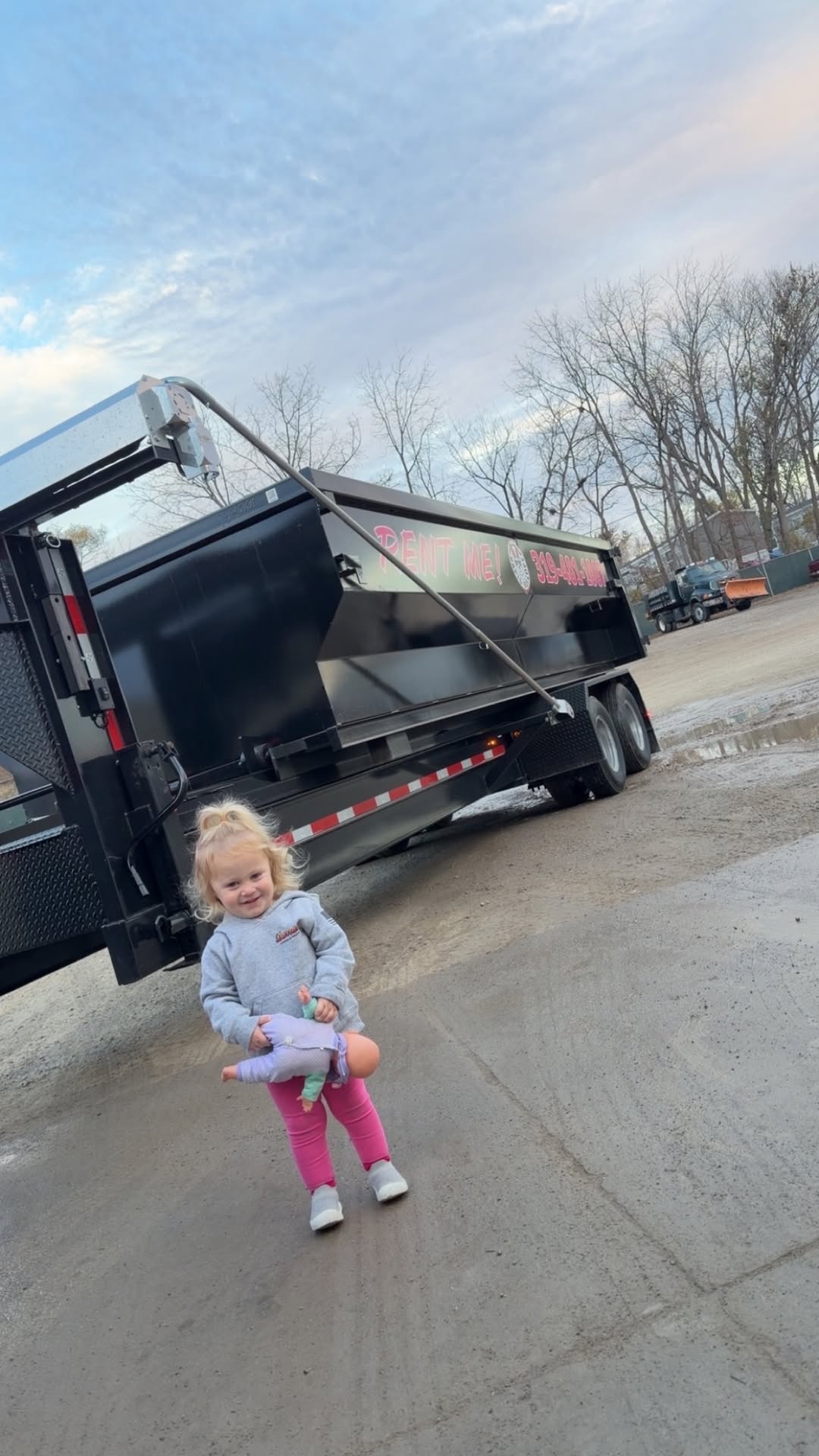 Rapid Rolloff's branded dumpster trailer in Marion